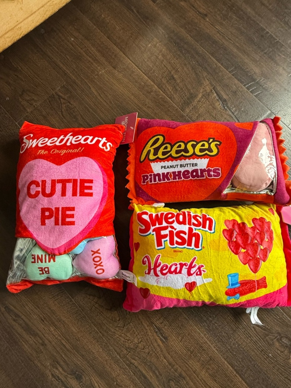 Three Candy Pillows With Plushies 14x9"